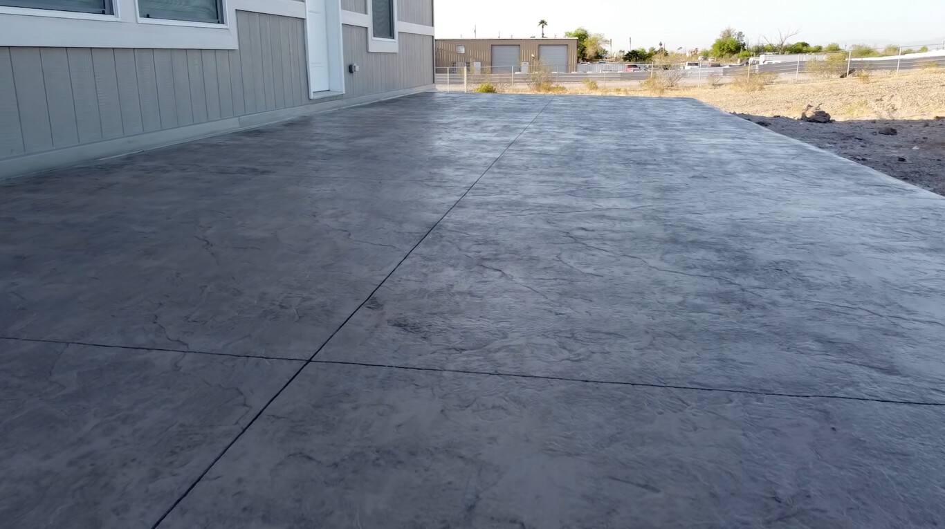Stamped concrete patio with modern finish in Monterey Park backyard